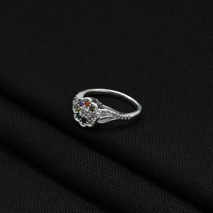 Stylish silver ring with a sparkling flower motif, featuring an array of colorful gemstones