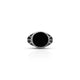 Close-up view of a sterling silver signet ring with a smooth black resin round centerpiece for a sleek, modern look.